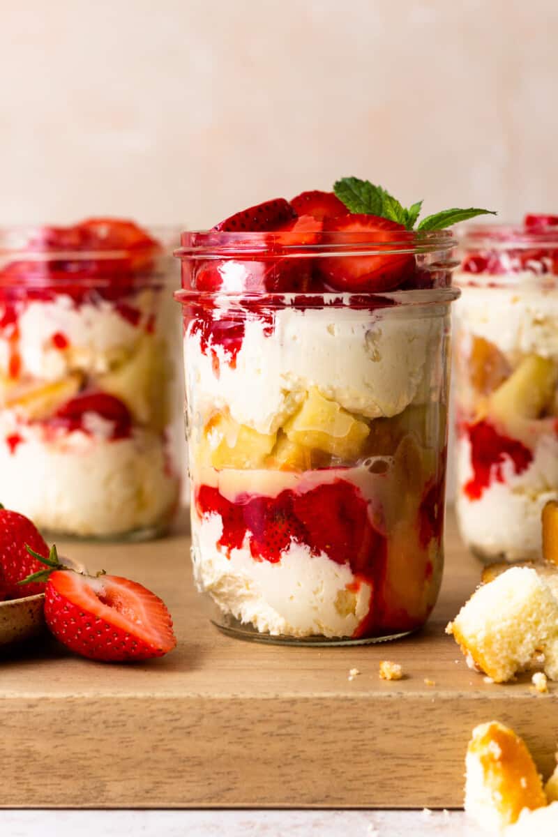 three jars of strawberry shortcake in cups