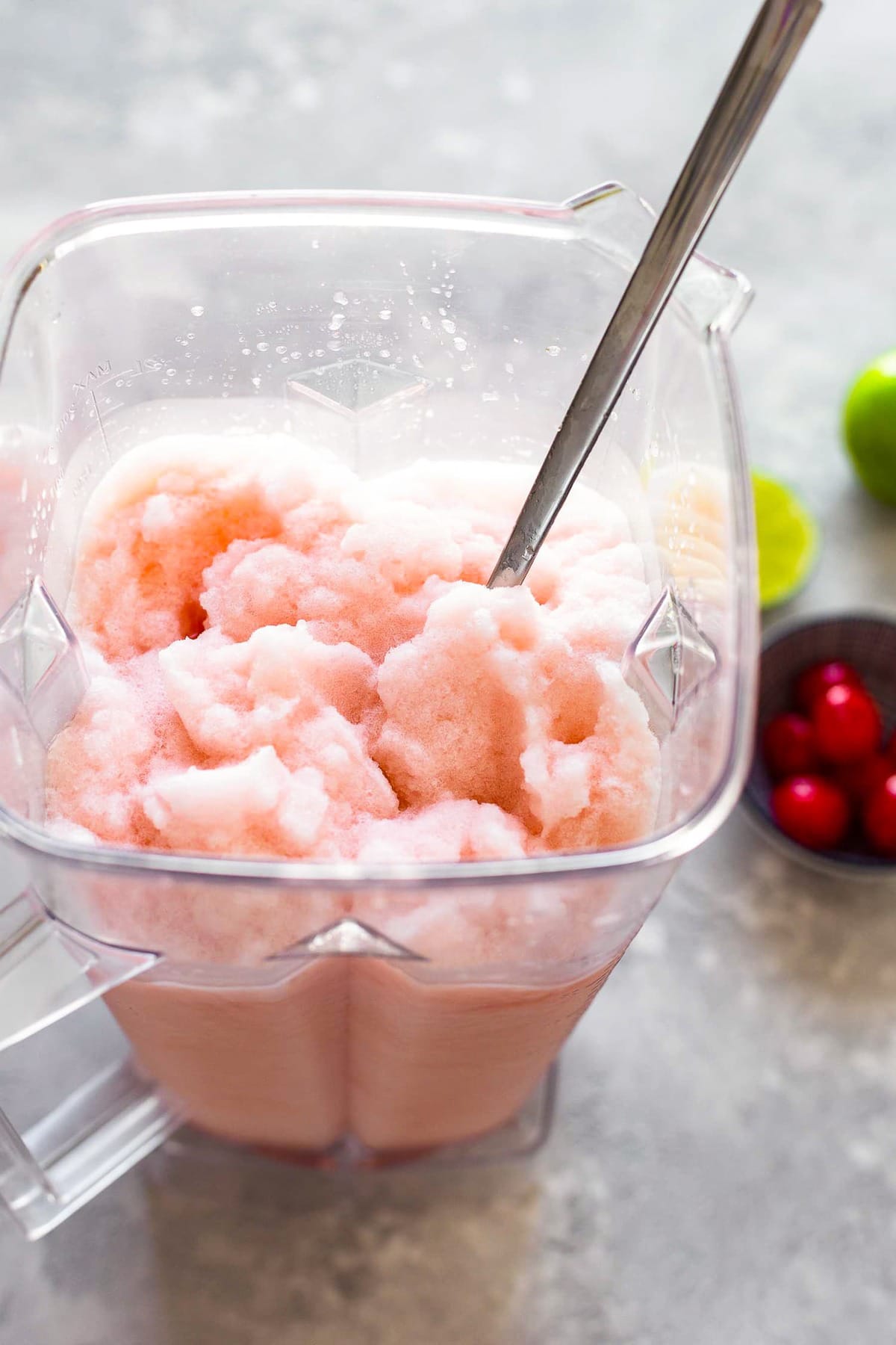 A blender jar filled with ingredients.