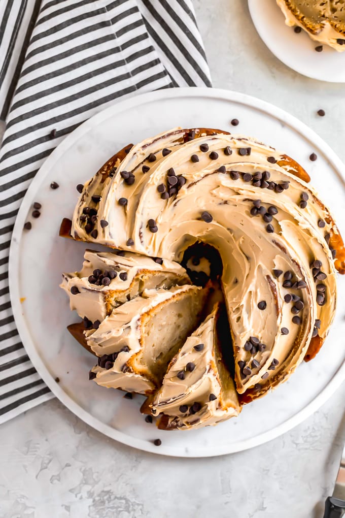 top view frosted bundt cake sliced 