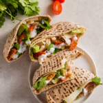 Chicken Pita Sandwiches are a healthy and delicious lunch option. This Chicken Avocado Sandwich is perfect for work days. Easy to make and so much flavor! These Chicken Avocado Pita Pockets prove that healthy lunches don't have to taste boring.