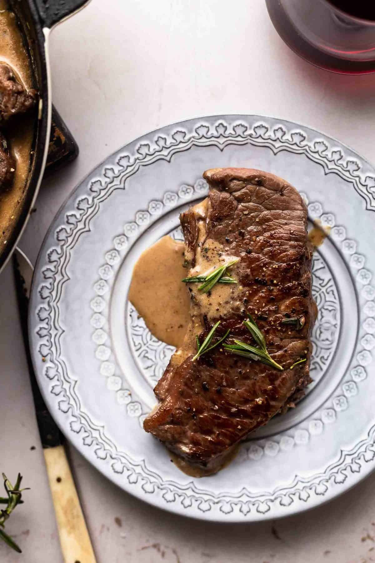 garlic rosemary steak on a plate