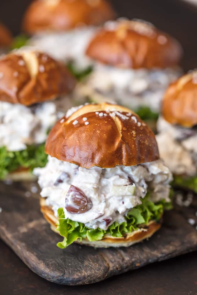 healthy shredded chicken salad sliders on pretzel rolls