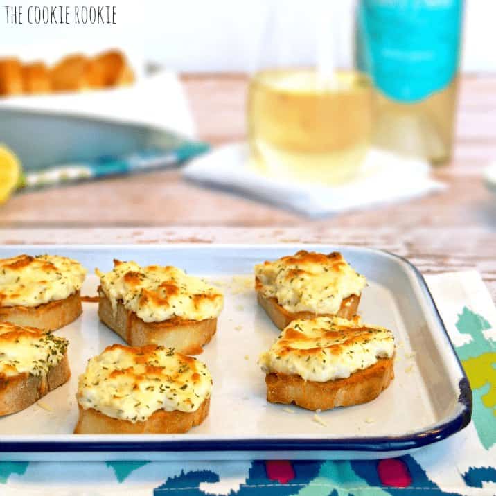 A tray of Creamy Artichoke Bruschetta appetizers.