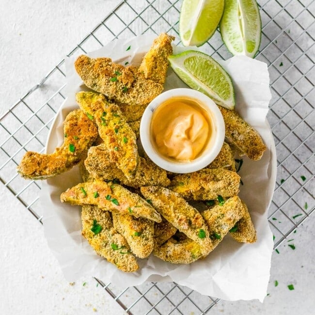 avocado fries on a wire rack in a bowl