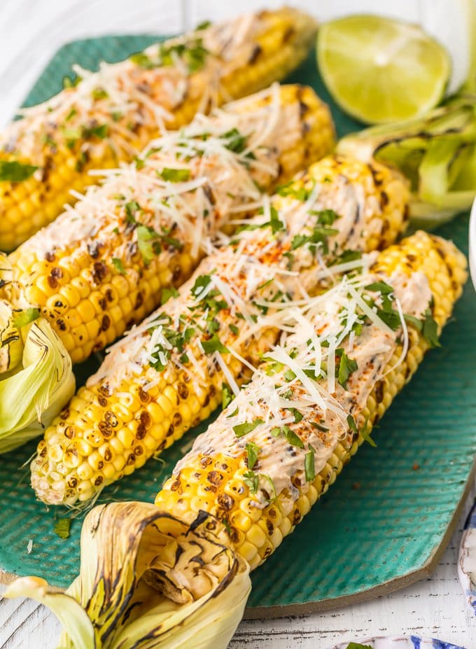 corn on the cob topped with cheese