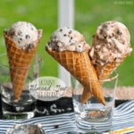 three cones of ice cream with chocolate chips in them.