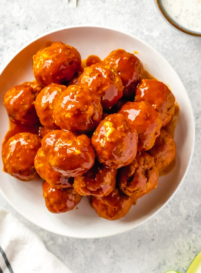 spicy buffalo chicken meatballs overhead picture on white plate