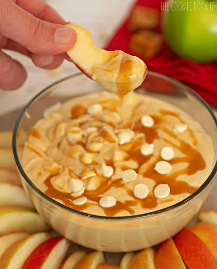 A bowl of food on a table, with Apple and Caramel
