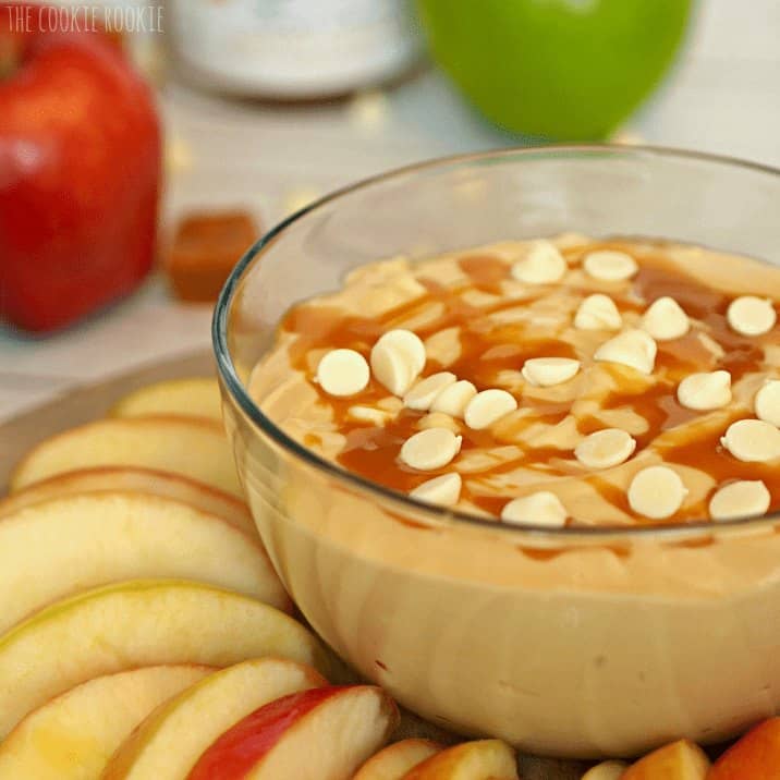 A bowl of oranges on a table, with Apple and Caramel