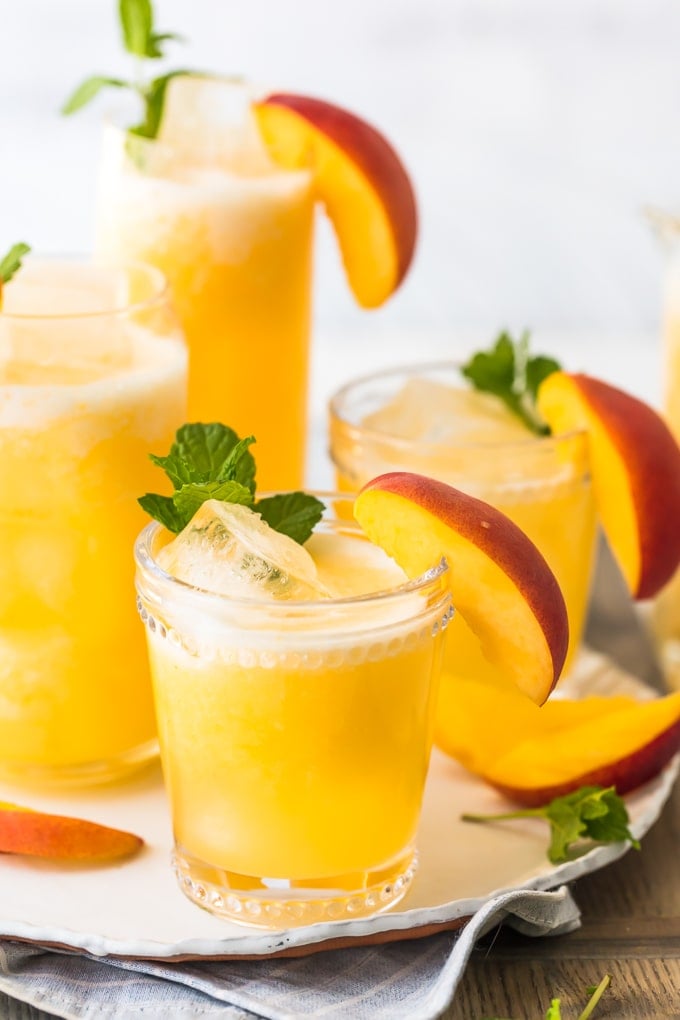 peach lemonade glasses on a plate