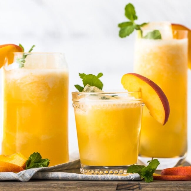 Peach Lemonade on a wooden platter