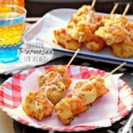 chicken parmesan skewers on a plate.