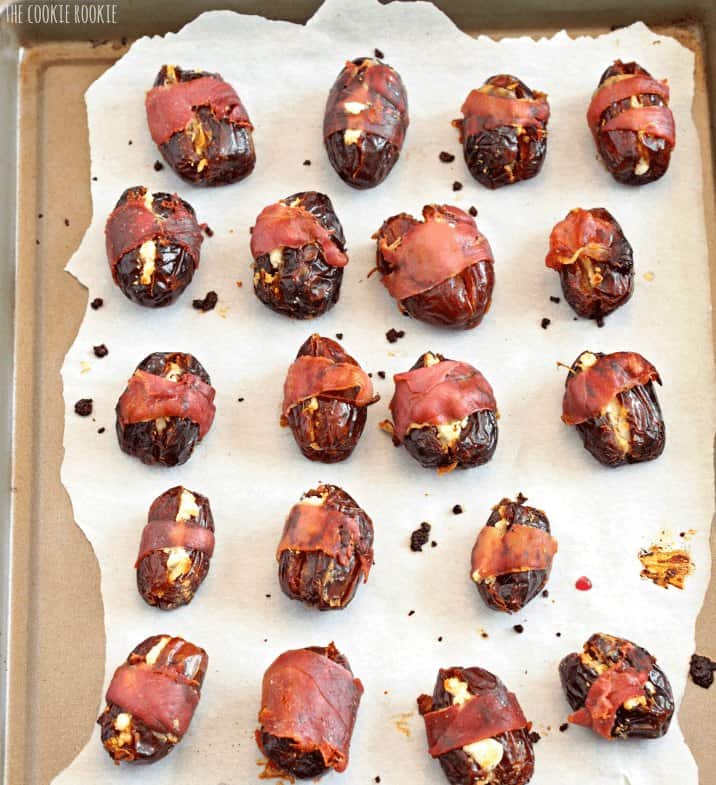Overhead view of Stuffed Dates wrapped in prosciutto.