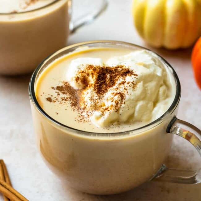 overhead hot pumpkin cocktail in mug with whipped cream