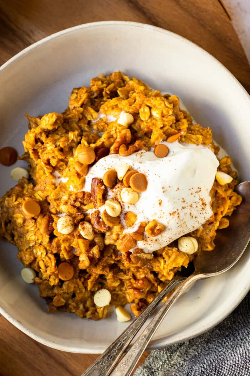 up close pumpkin oatmeal in white bowl