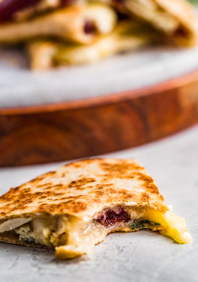 Thanksgiving Leftovers Quesadilla, cut to show the melty interior.