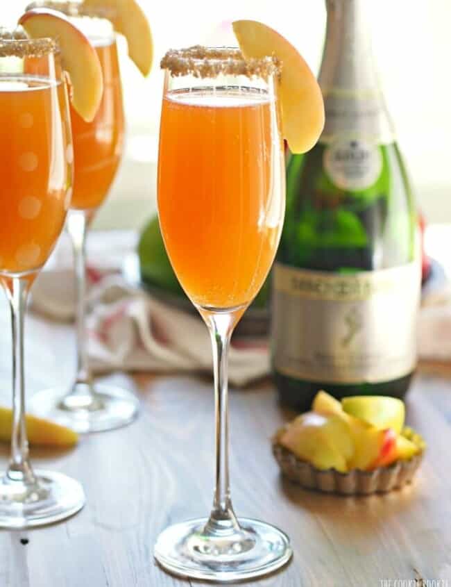 This Apple Cider Mimosa Recipe is simple, delicious and the perfect for Fall! You deserve such a fun and bubbly treat once in a while. Thanksgiving is the perfect time for an Apple Cider Cocktail, especially one as easy and tasty as this. If you've wondered how to make the perfect mimosa, this recipe is for you! I love a Mimosa, and this is my favorite Mimosa Recipe!
