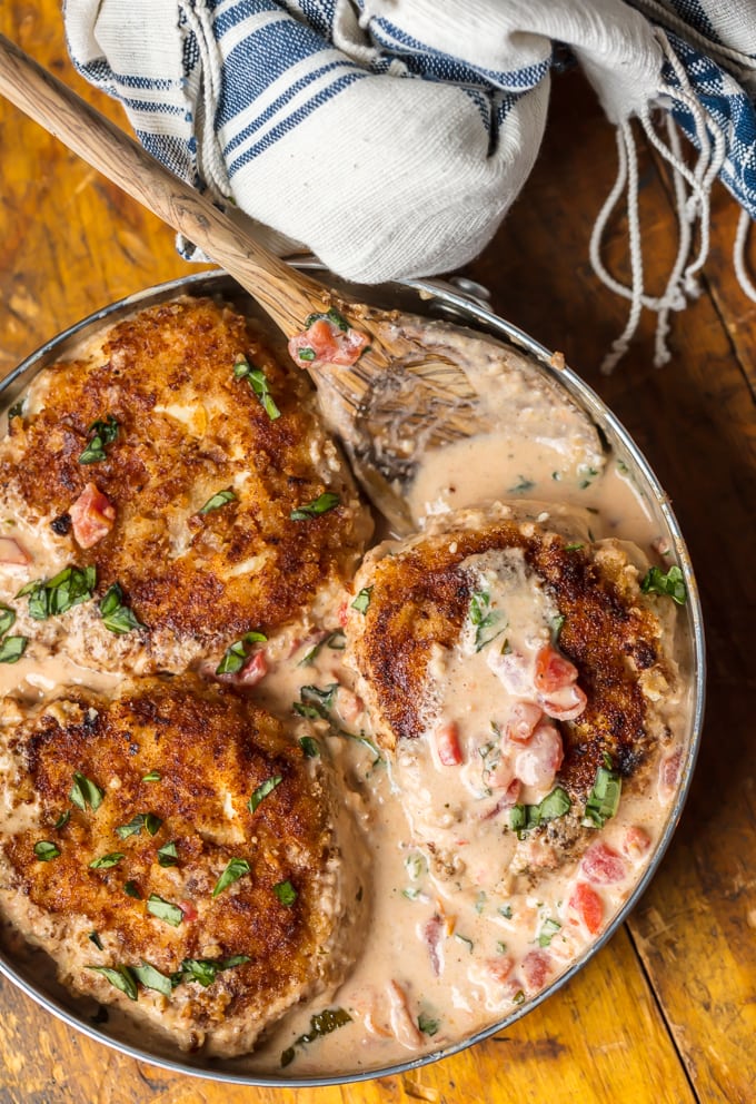 Skillet Basil Cream Chicken has always been one of my favorite recipes. Creamy sauce, breaded chicken, tomatoes, fresh herbs, and more make up this super easy, delicious, and fool-proof chicken dinner.
