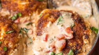 Basil Chicken with Cream Sauce has always been one of my favorite recipes. This Basil Chicken Recipe has a creamy sauce made with buttermilk and cheese that is just to die for. Easy breaded chicken, tomatoes, fresh herbs, and more make up this super easy, delicious, and fool-proof Skillet Chicken Recipe. You need this Cream Chicken in your life ASAP!