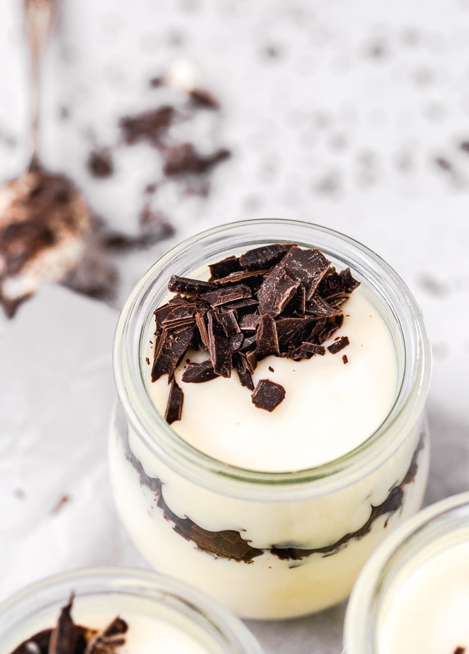 white chocolate mousse in small glass jars