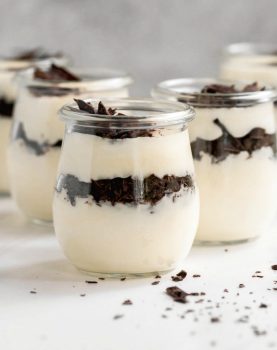 White Chocolate Mousse is just so rich and creamy! There's nothing better than a SUPER Easy White Chocolate Mousse recipe with only TWO ingredients. This is one of our favorite Easy Christmas recipes, but it's delicious year round as well. This Easy Chocolate Mousse Recipe has layers of white chocolate mousse and mini chocolate chips make a great individual dessert anyone would love. What are you waiting for?