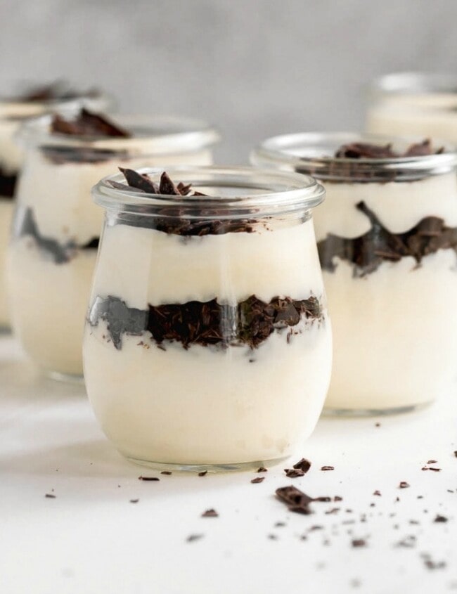 White Chocolate Mousse is just so rich and creamy! There's nothing better than a SUPER Easy White Chocolate Mousse recipe with only TWO ingredients. This is one of our favorite Easy Christmas recipes, but it's delicious year round as well. This Easy Chocolate Mousse Recipe has layers of white chocolate mousse and mini chocolate chips make a great individual dessert anyone would love. What are you waiting for?