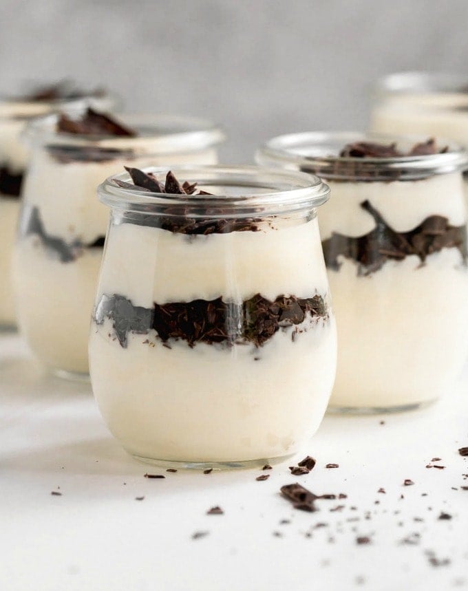 White Chocolate Mousse layered into small glass jars