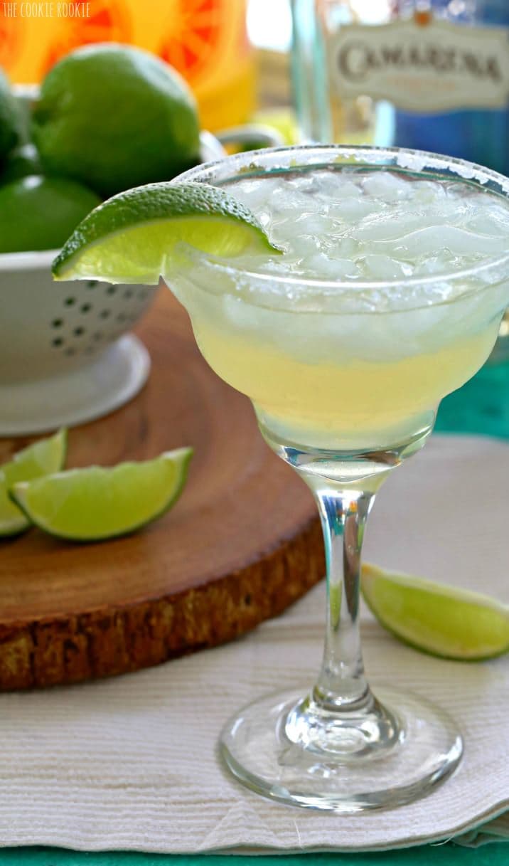 Beergarita with salted rim and lime wedge on a table