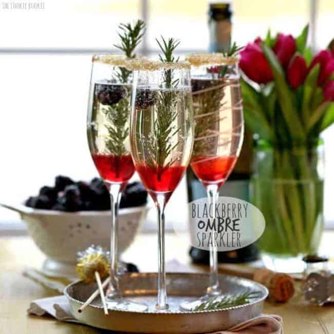 Blackberry Ombre Sparkler!! Made with Blackberry Simple Syrup, Champagne, and Rosemary. Perfect for Christmas and Valentine's Day! | The Cookie Rookie