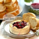 blackberry baked cheese with cranberries and bread.