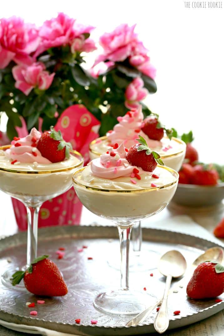 no bake cheesecake cups in front of flowers