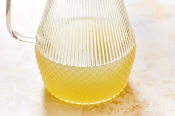limeade concentrate in a ribbed glass pitcher.