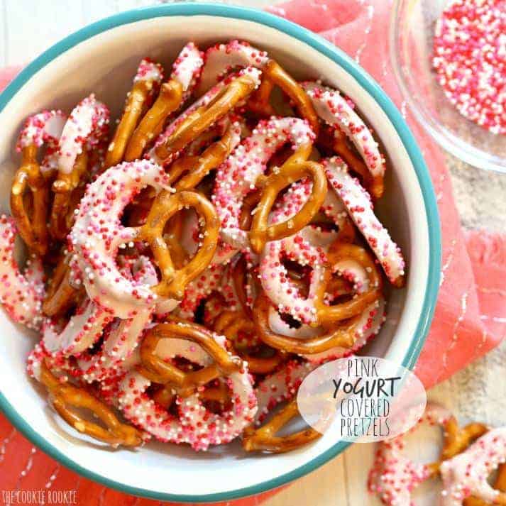 a bowl of pink yogurt covered pretzels