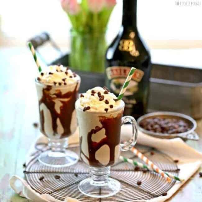 Irish Cream Shakes topped with whipped cream on table