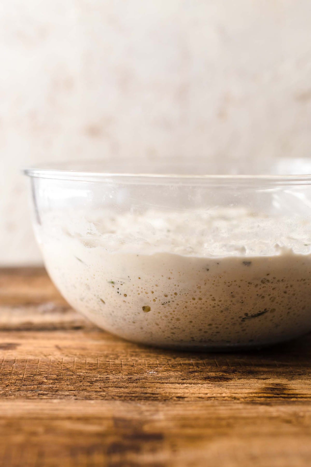 bread dough resting in a bowl