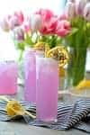 Lavender Lemonade is a pretty and delicious fragrant drink perfect for any party or baby shower! Fun, bright, and yummy! Non-alcoholic or boozy!