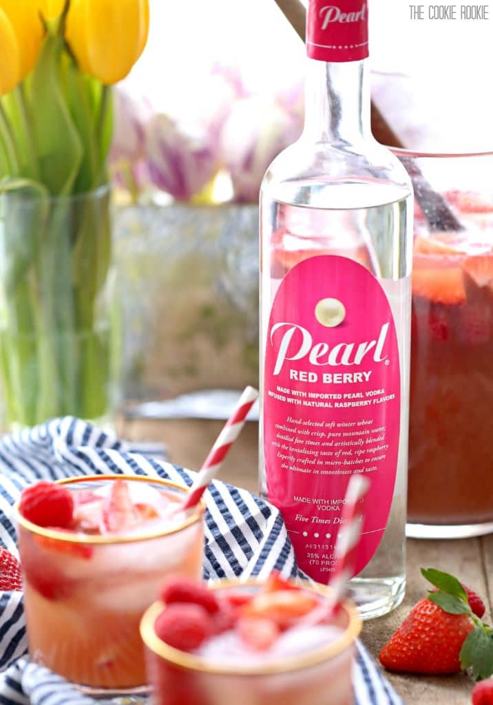 Pearl Red Berry vodka Bottle with glasses of sangria