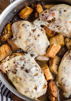 French Onion Chicken is an easy go-to meal the entire family will love! This skillet chicken recipe tastes just like your favorite soup in main course form. French Onion Soup Chicken is chicken breast topped with swiss cheese, french onion soup, croutons, and more cheese!
