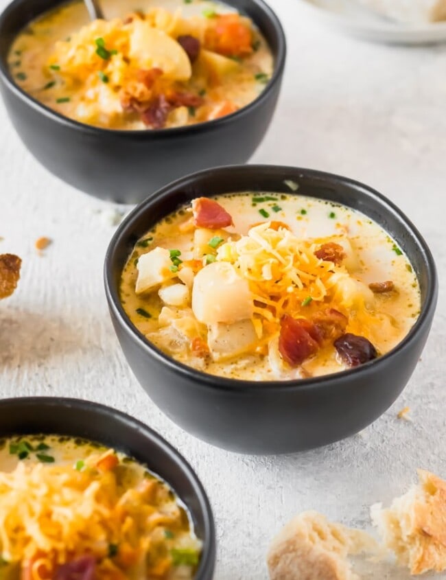Crockpot Potato Soup is a Healthy Potato Soup we simply love. This Recipe for Potato Soup makes things easy by using a slow cooker! Set it and forget it...until it's time to eat. Just because this is a healthy version doesn't mean it's any less flavorful than your favorite Potato Cheese Soup. Crockpot Loaded Potato Soup for the win!