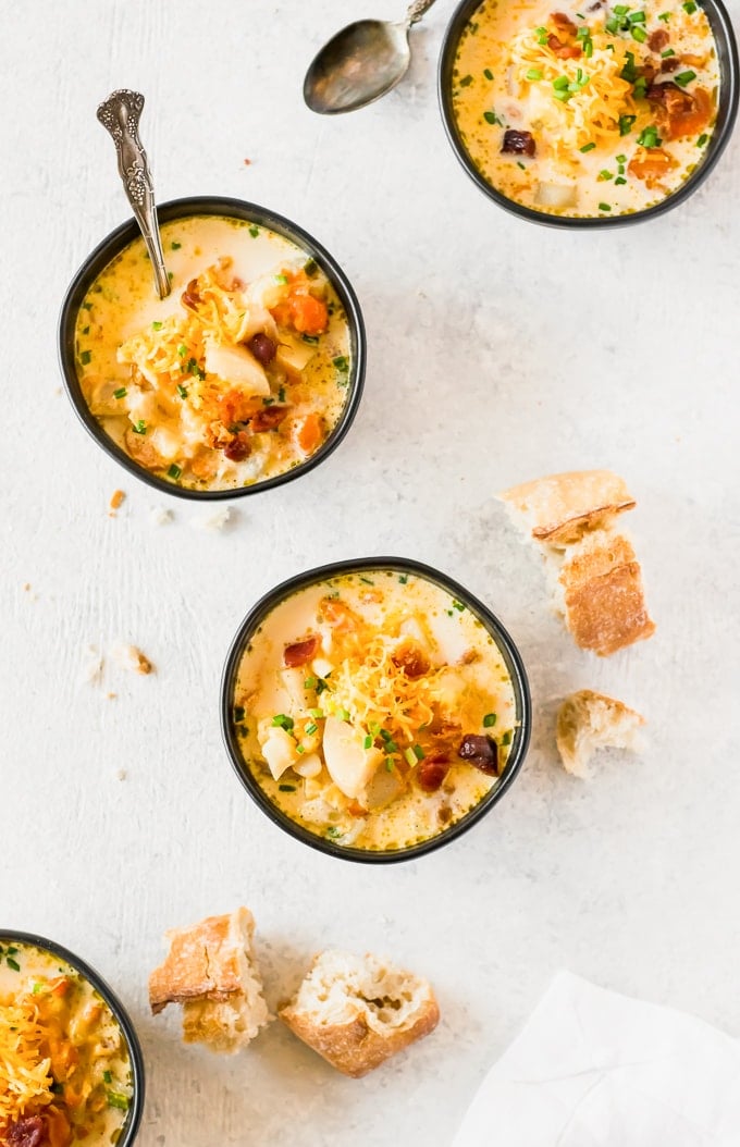bowls of loaded potato soup viewed from above
