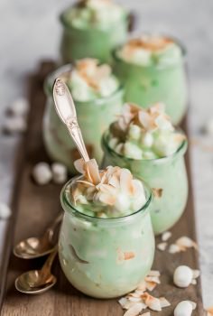 Watergate Salad is the perfect Easter side dish! Also known as Pistachio Fluff, this Watergate Salad recipe is fluffy and delicious. Grab a spoon because this classic dessert recipe has a place at every table, especially holiday tables!