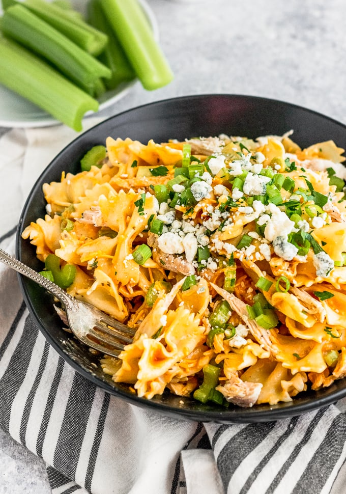 side view with buffalo chicken pasta salad with blue cheese crumbles