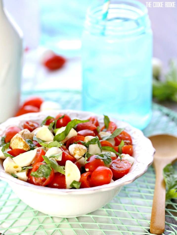 Chopped Caprese Salad is the perfect easy side dish for any BBQ! Simple, delicious, and healthy! Tomato, Mozzarella, Basil, and Balsamic Vinegar. A family favorite!