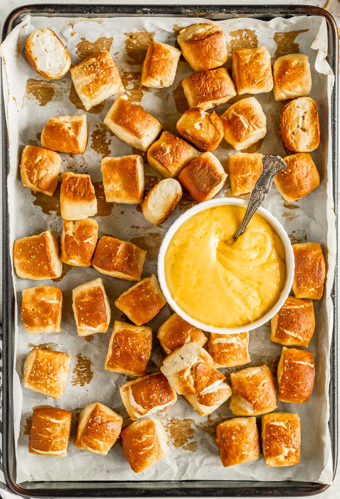 pretzel bites surrounding a bowl of cheese
