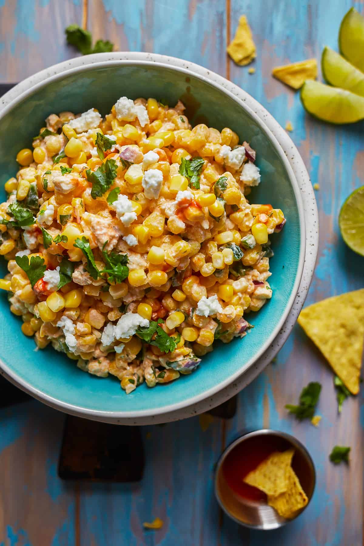 green bowl filled with healthy Mexican street corn dip