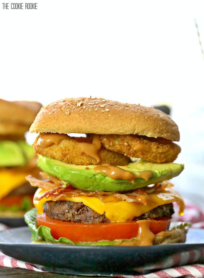 It doesn't get better than Loaded Cowboy Burgers with Spicy BBQ Mayo! Cheese, bacon, avocado, onion rings, ALL THE TOPPINGS! BEST BURGER EVER!