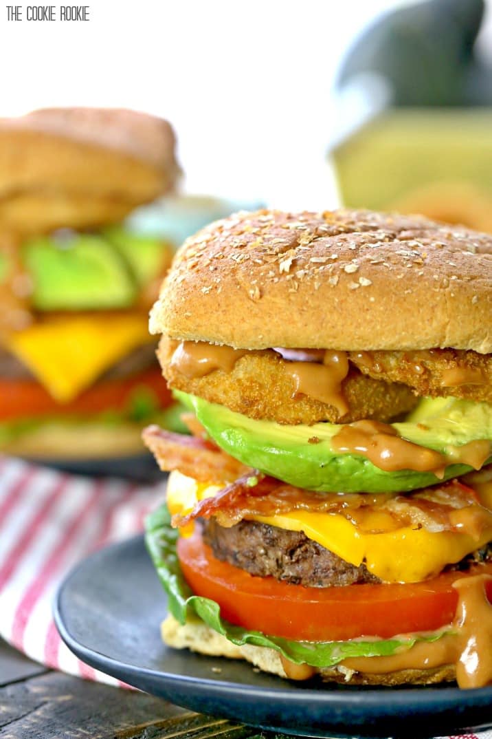 It doesn't get better than Loaded Cowboy Burgers with Spicy BBQ Mayo! Cheese, bacon, avocado, onion rings, ALL THE TOPPINGS! BEST BURGER EVER!