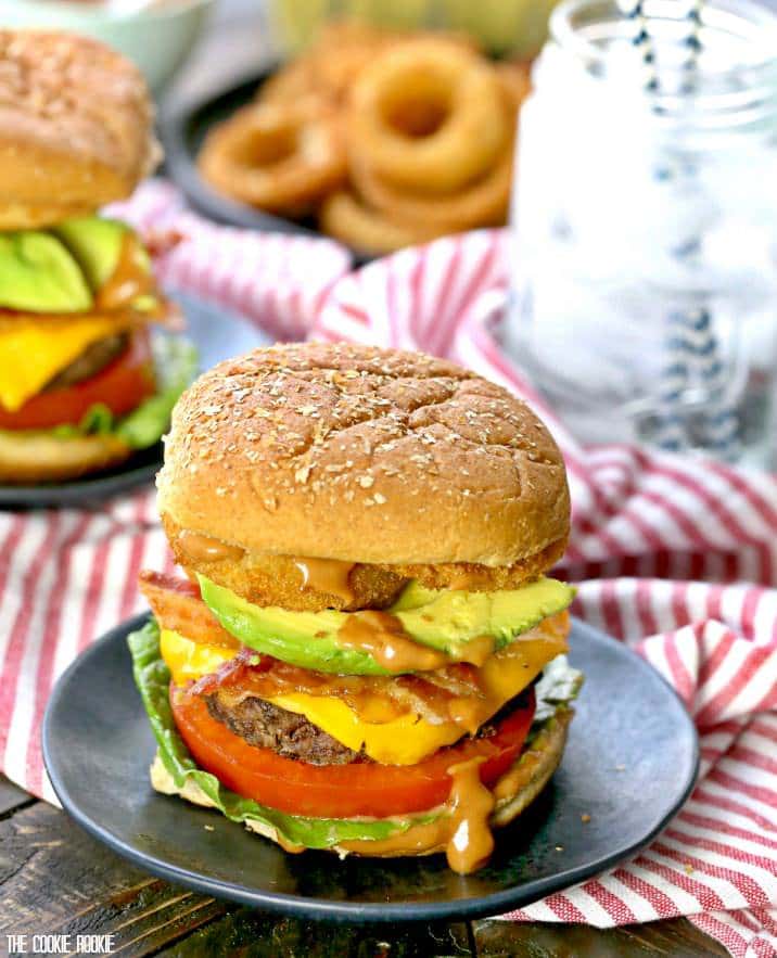 It doesn't get better than Loaded Cowboy Burgers with Spicy BBQ Mayo! Cheese, bacon, avocado, onion rings, ALL THE TOPPINGS! BEST BURGER EVER!