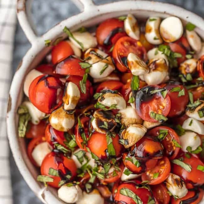 Chopped Caprese Salad is the perfect easy side dish for any BBQ! Simple, delicious, and healthy! Tomato, Mozzarella, Basil, and Balsamic Vinegar. A family favorite! This Caprese Salad Recipe (Tomato Mozzarella Salad) is my go-to side dish for everything Summer!