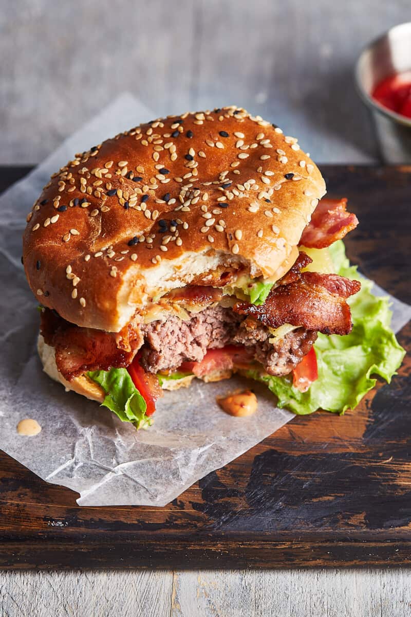 overhead bite out of loaded cowboy burger